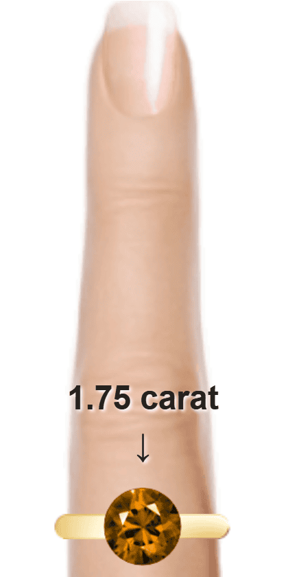 Brown 1.75 carat round-cut Quartz on a ring and finger.