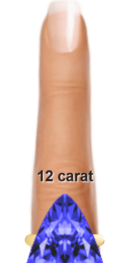 Blue 12 carat trillion-cut Tanzanite on a ring and finger.