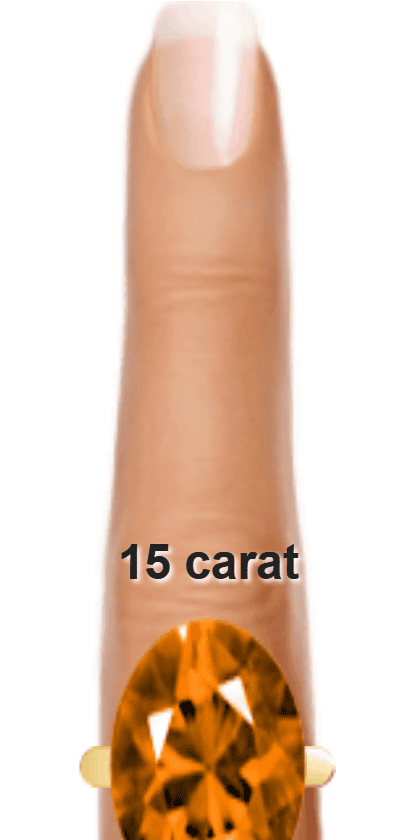 Orange 15 carat oval-cut Andesine on a ring and finger.