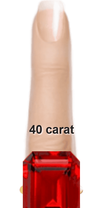 Red 40 carat emerald-cut Spinel on a ring and finger.